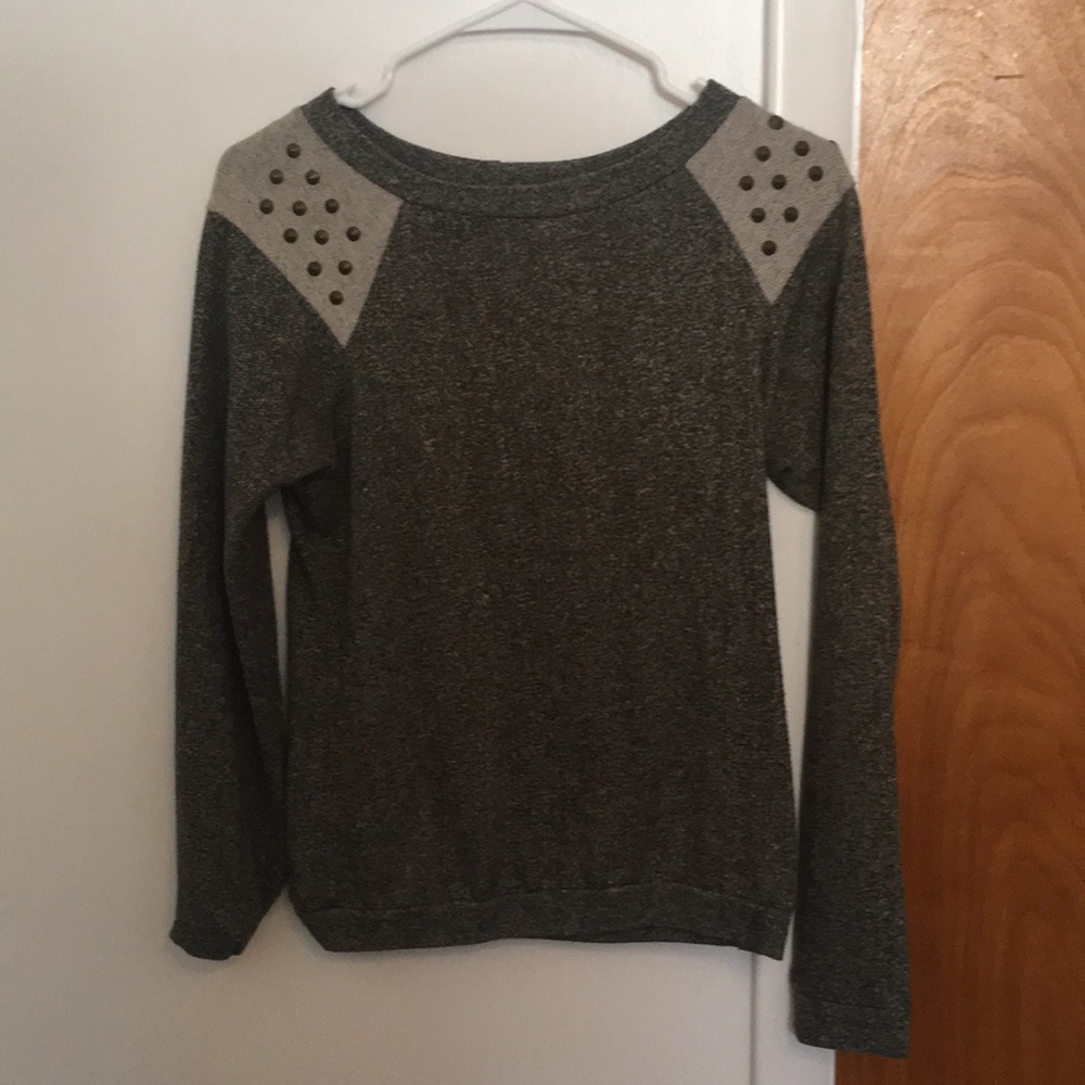 Studded sweater. From buckle.